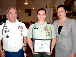 The Military Officers Association of America honored Heritage High School senior Isabella Stringer and fellow cadets during an April ceremony at Patrick Air Force Base. Stringer, of Cuban-American descent, was joined by her mother, Hilda, and her JROTC instructor, First Sergeant Carlos Colon Robles.