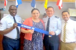  From left to right MSgt Eddie Carr, AFJROTC Instructor, Ms. Alexander Hernandez, Principal, Lt Col Ralph Gracia, AFJROTC Unit Commander, and Mr. Peter Ng-A-Fook, Assistant Principal 